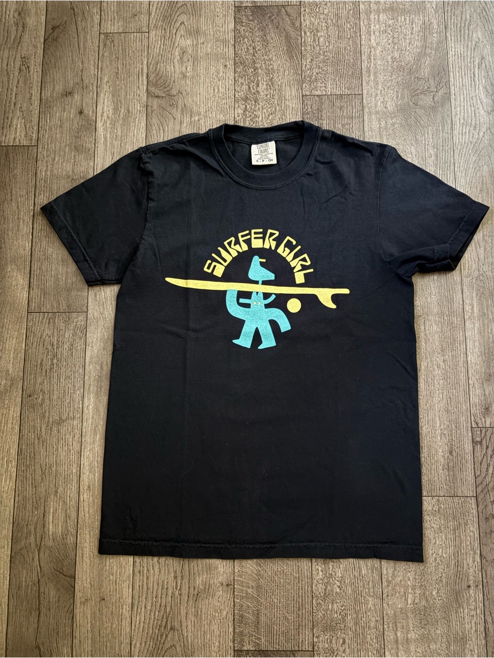 Comfort Colors Black Short-Sleeve Tee with Yellow & Teal Surfer Graphic